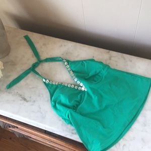 Green halter neck bathing suit top.